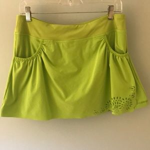 Athleta sporty skirt with floral cutout and shorts